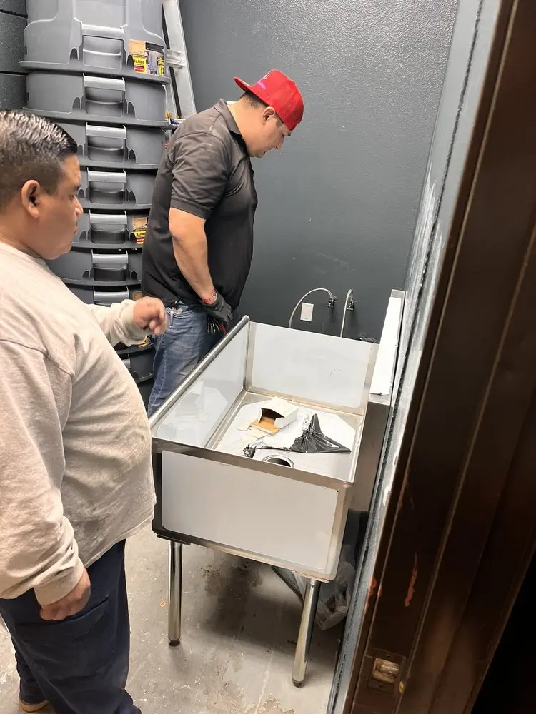 Commercial plumbing and sink installation in Le Ray