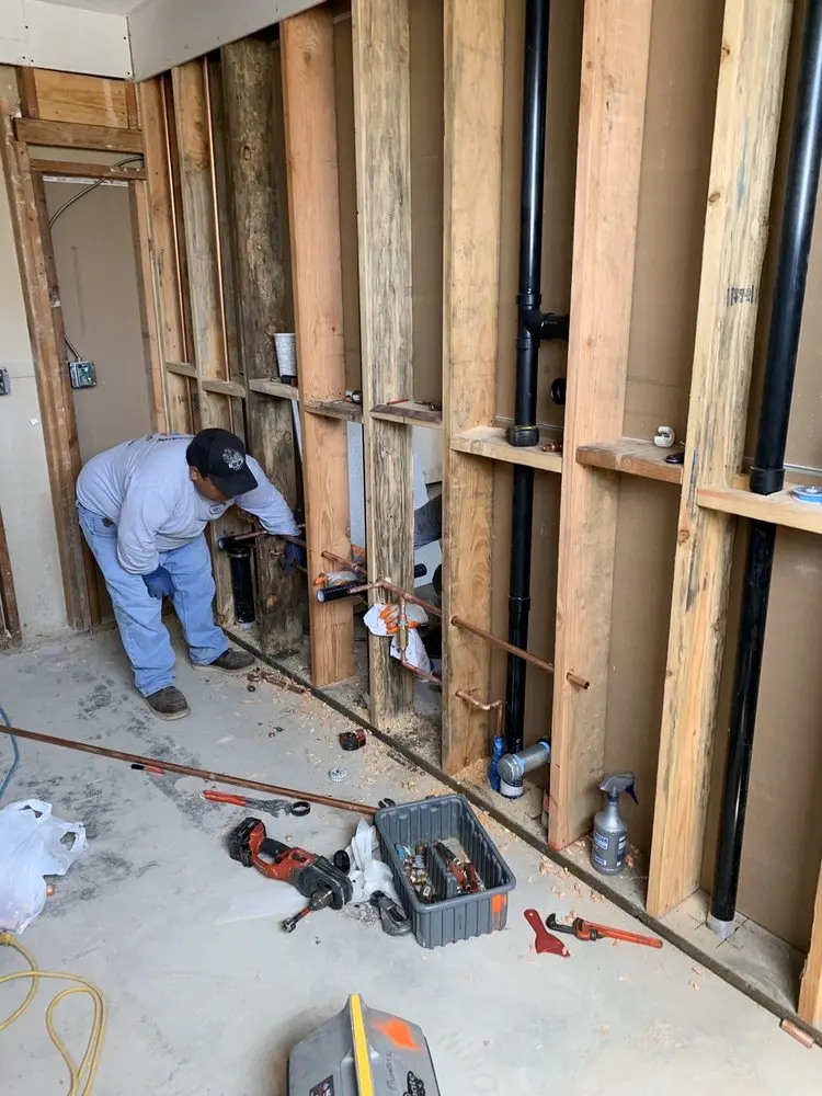 Commercial rough-in plumbing for Water Heater Replacement in Le Ray